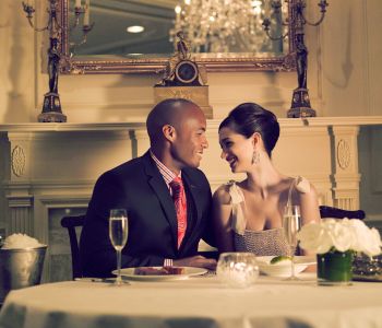 Romantic couple sharing dinner at The Lafayette Restaurant