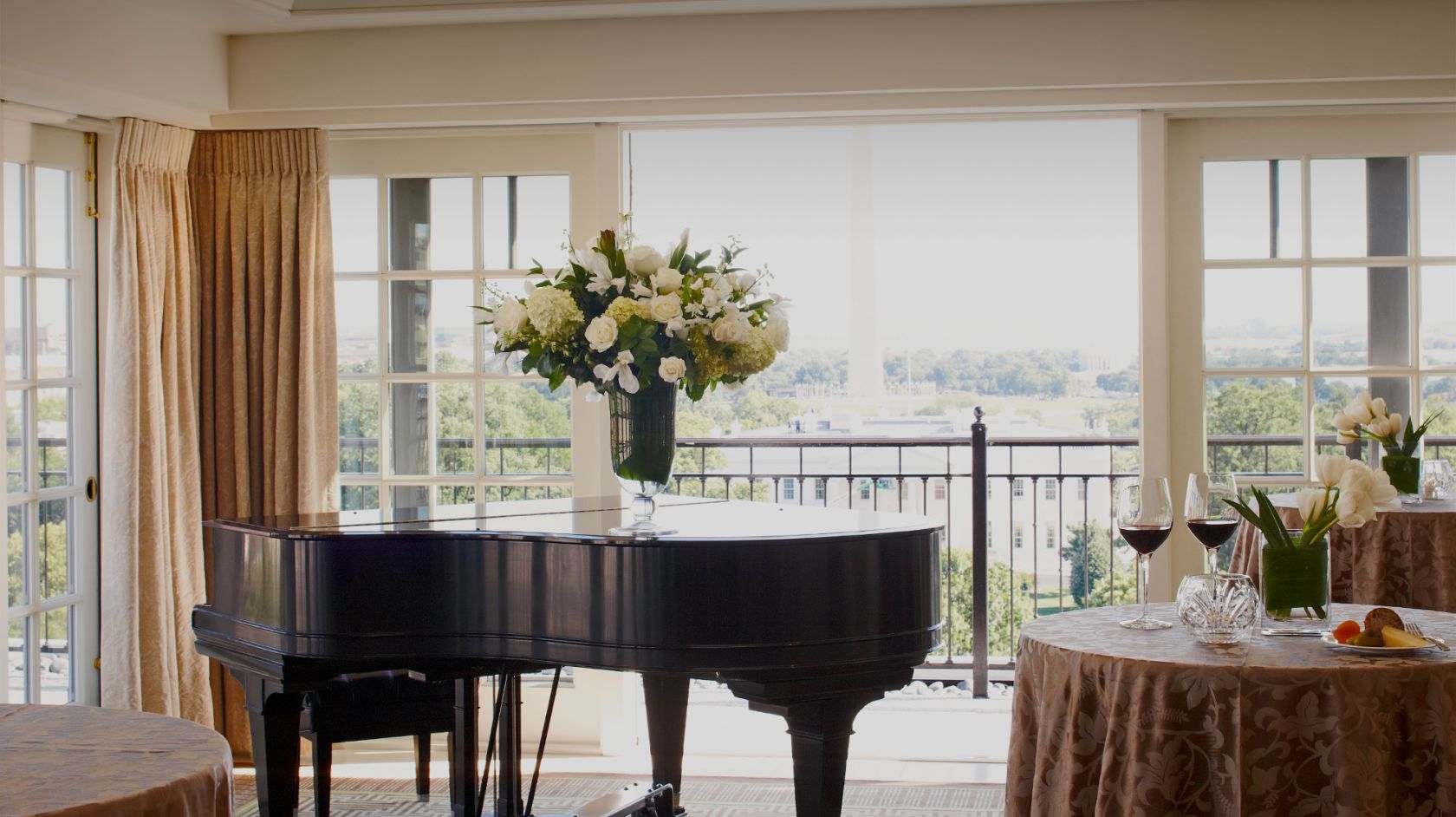 Piano in the Top of the Hay at The Hay-Adams Hotel, featuring a scenic view of The Washington Monument